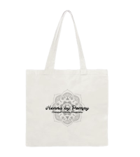 a white tote bag with an image of a mandala on it