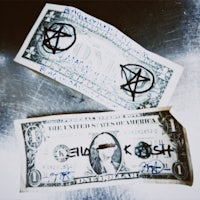 a dollar bill with a pentagram on it